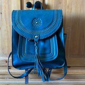 Brand new, no tags and never used. Beautiful blue coral color.